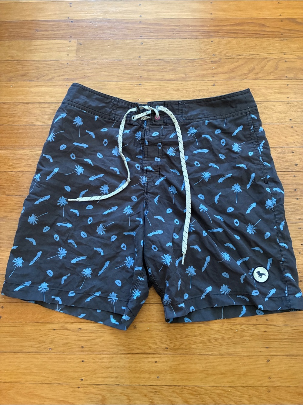 Modern Amusement Black Swim Trunks with Blue Palm Print
